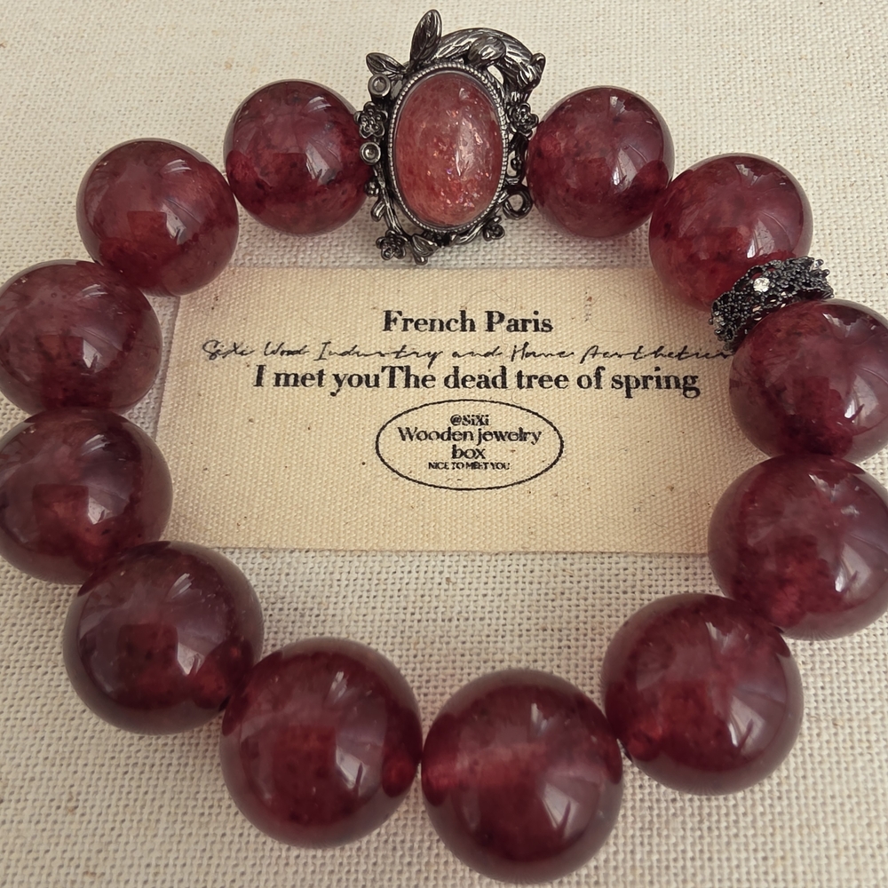 Elegant Red Beaded Bracelet with Ornate Silver Accent